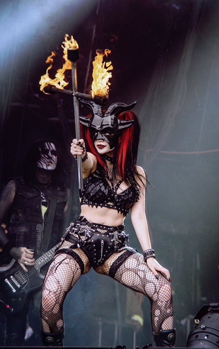 Dani Divine on stage at Bloodstock Festival with horror metal band, Wednesday 13.